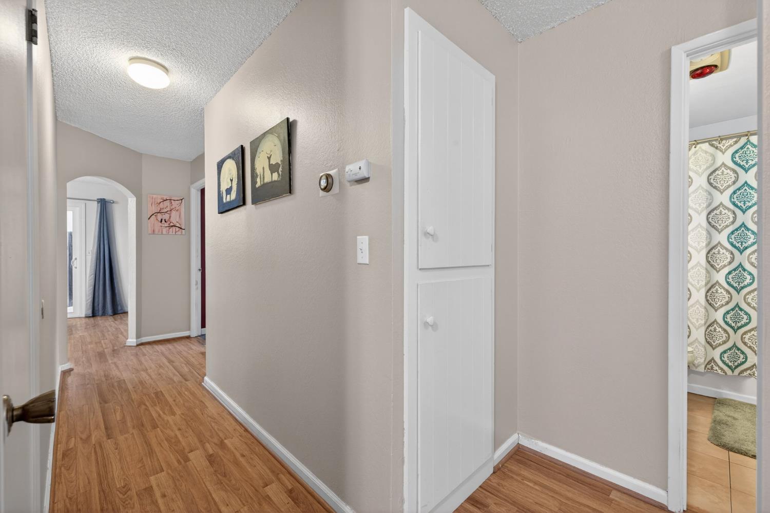 6816 Tareyton Way Citrus Heights, CA 95621 - Photo 28 of 46 a view of a hallway with wooden floor and staircase