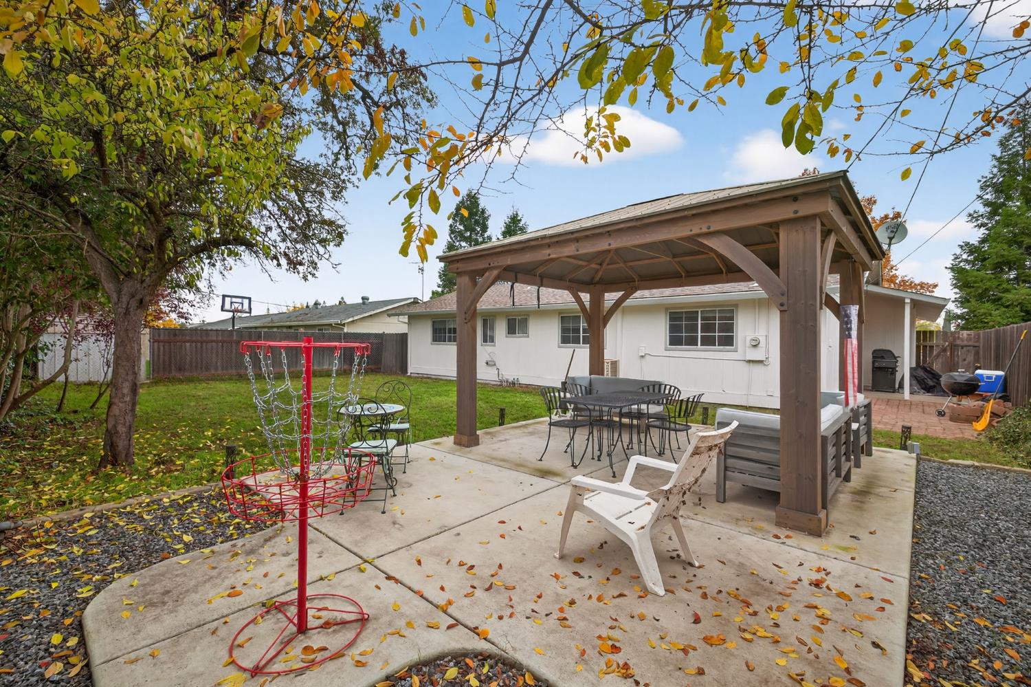 6816 Tareyton Way Citrus Heights, CA 95621 - Photo 29 of 46 a patio with a yard table and chairs