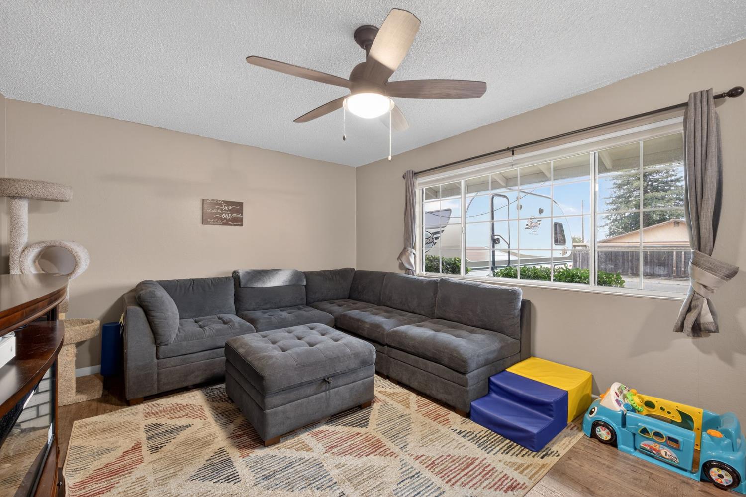 6816 Tareyton Way Citrus Heights, CA 95621 - Photo 3 of 46 a living room with furniture and a large window