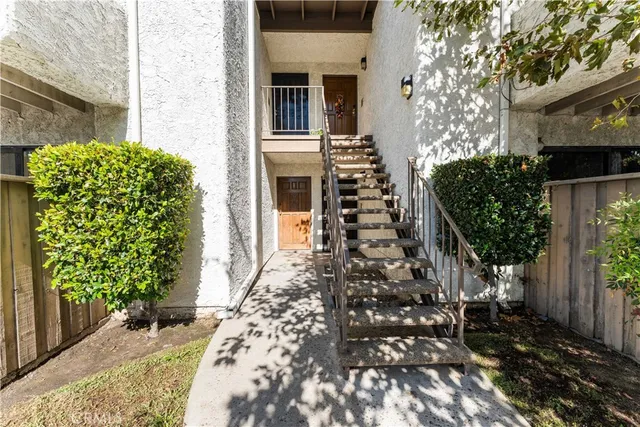 a house view with a outdoor space