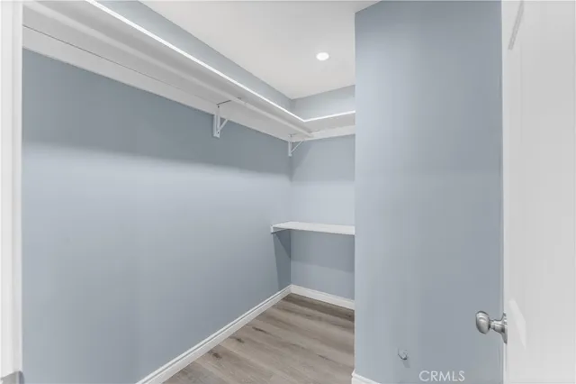 a view of an empty walk in closet