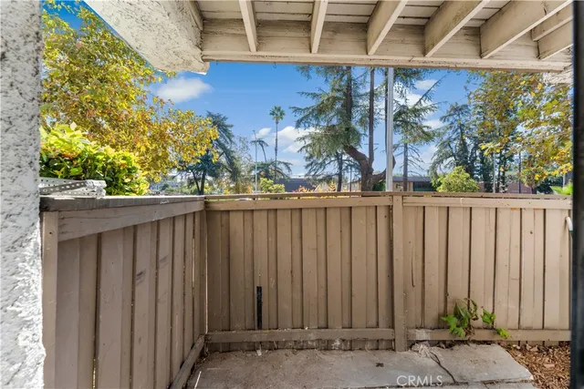 a view of a wooden fence