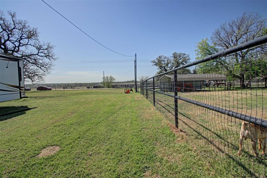 3559 Springfield Road Springtown, TX 76082 - Photo 27 of 36 a view of a backyard