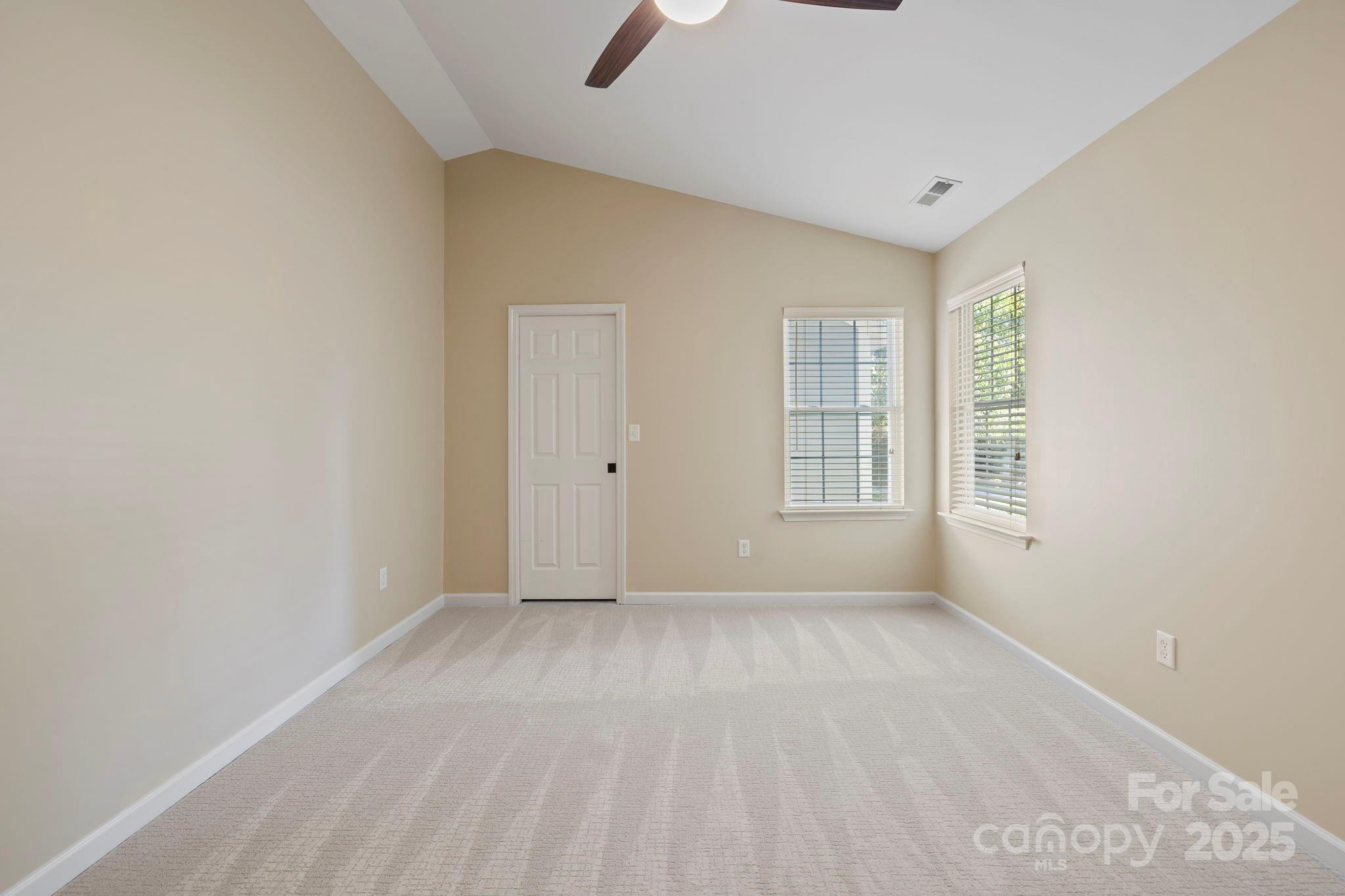 241 Fairway View Drive Etowah, NC 28729 - Photo 21 of 37 an empty room with windows