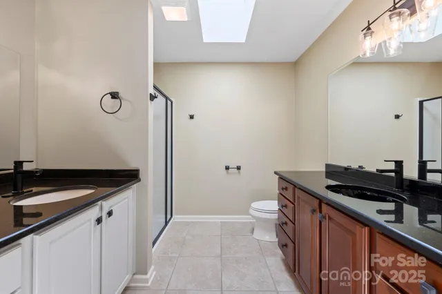a kitchen with a sink and a stove top oven