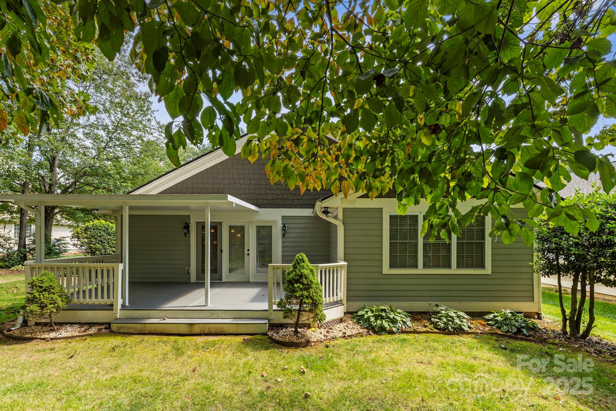241 Fairway View Drive Etowah, NC 28729 - Photo 7 of 37 a front view of a house with a tree in it