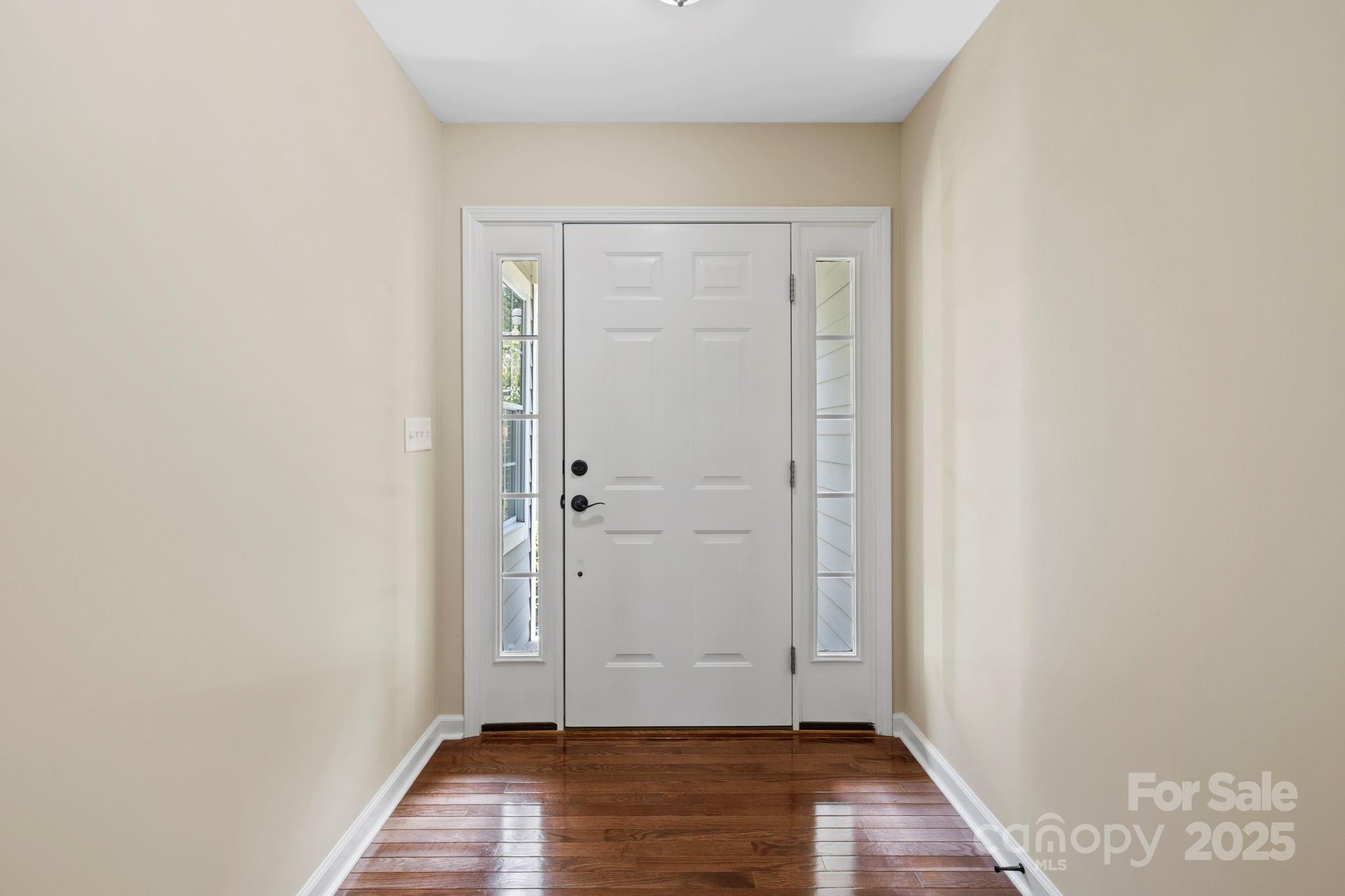 241 Fairway View Drive Etowah, NC 28729 - Photo 10 of 37 an empty room with wooden floor and closet