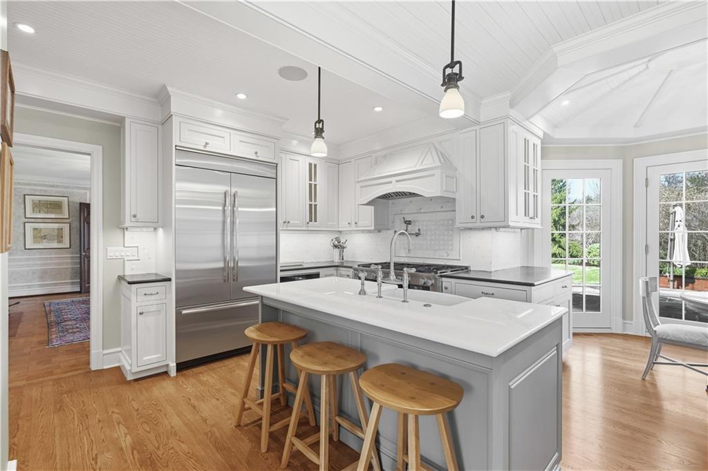 600 Backbone Road Sewickley, PA 15143 - Photo 20 of 50 Another kitchen view highlights the spacious island, surrounding cabinetry, and bright open feel.