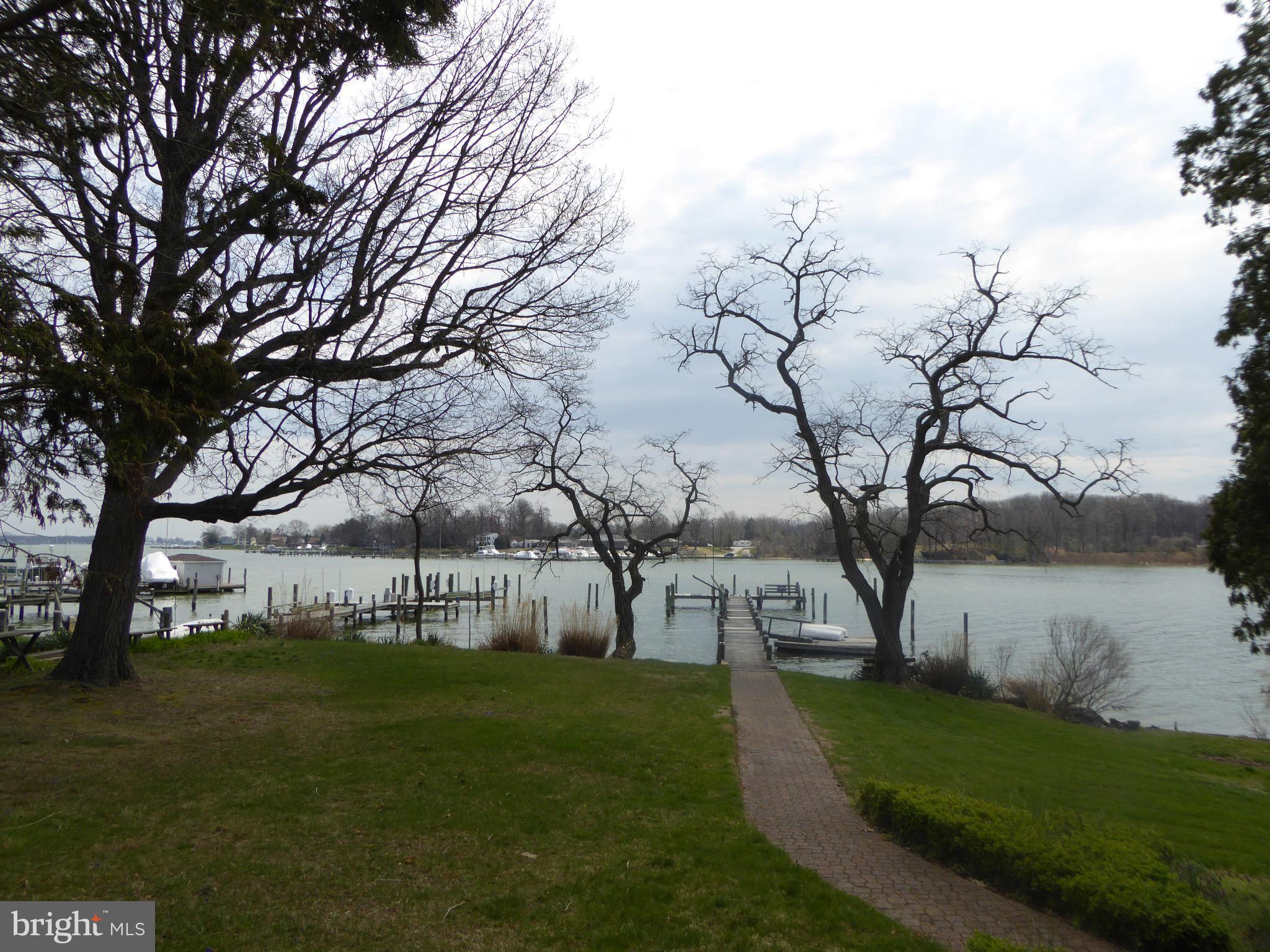 348 Miles Road Baltimore, MD 21221 - Photo 3 of 10 a view of a park with large trees