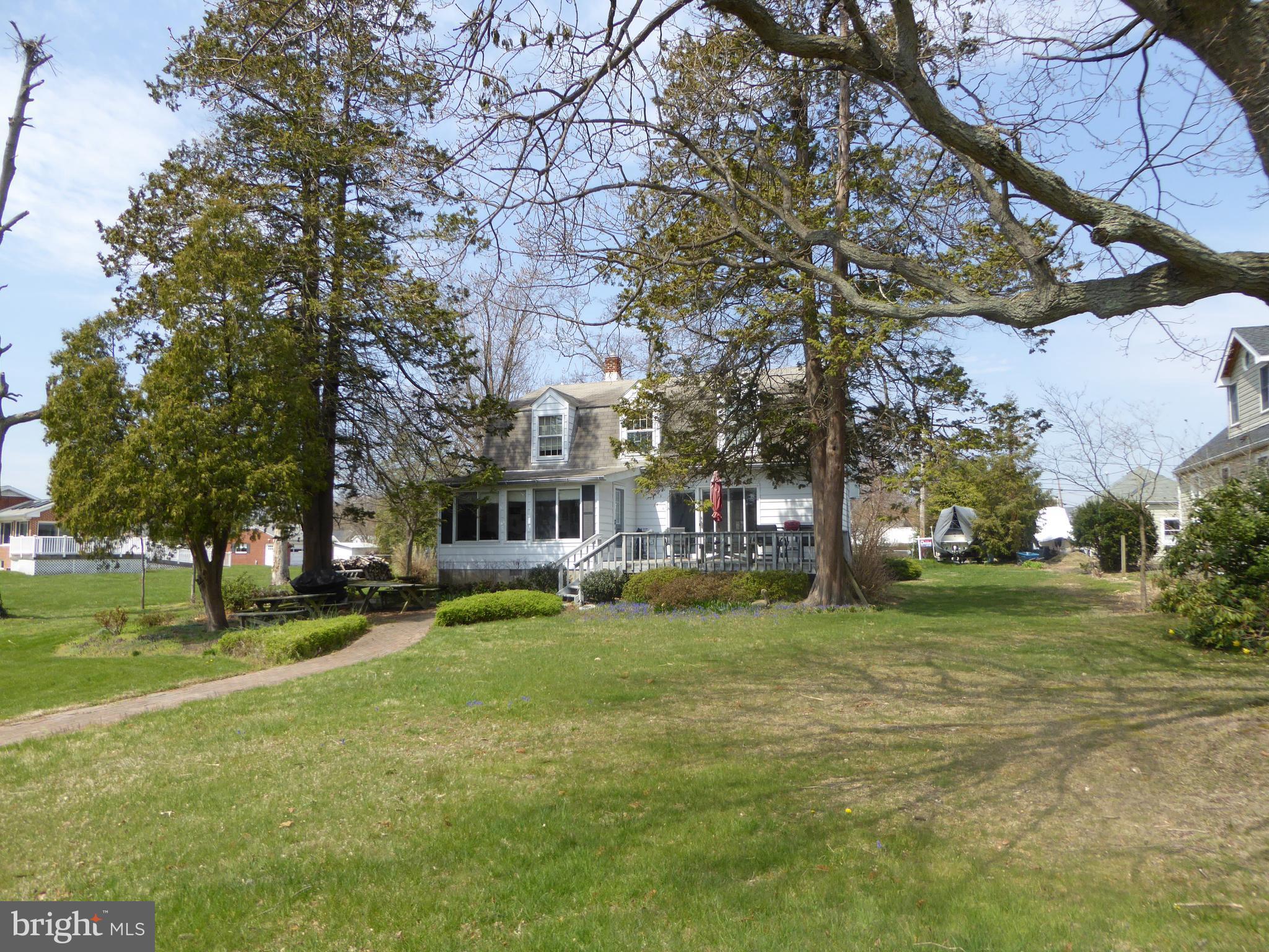 348 Miles Road Baltimore, MD 21221 - Photo 6 of 10 a view of a house with a yard