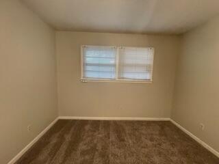 5414 7th Street Lubbock, TX 79416 - Photo 4 of 11 an empty room with a window