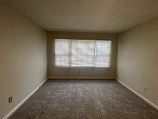5414 7th Street Lubbock, TX 79416 - Photo 10 of 11 an empty room with a window