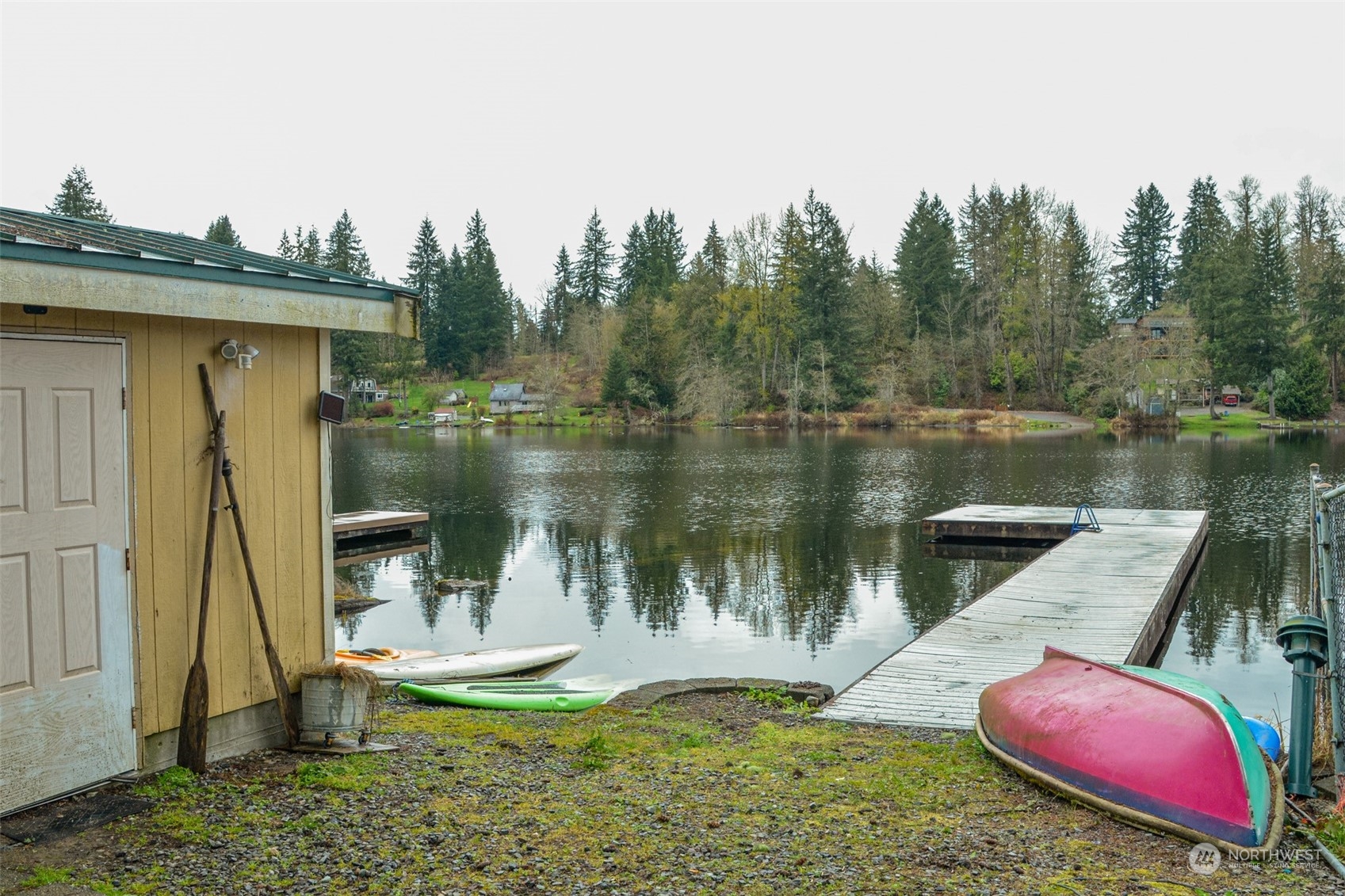 5525 Lerch Road Snohomish, WA 98290 - Photo 8 of 12 a view of a lake with a house in the background