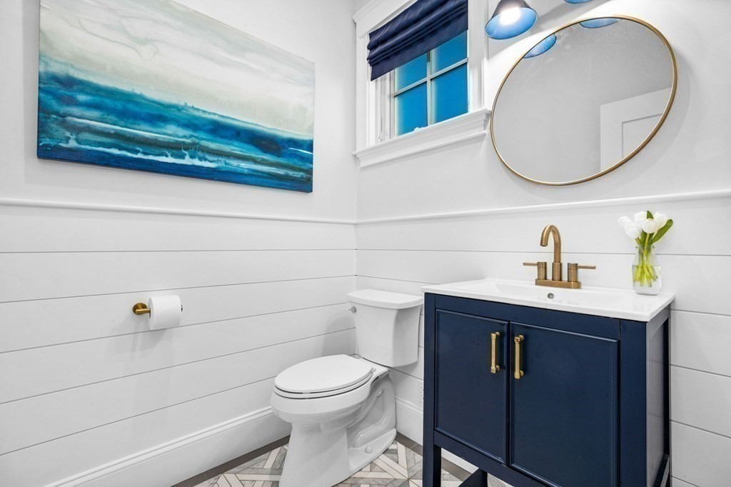 20 Collier Road Scituate, MA 02066 - Photo 17 of 42 a bathroom with a toilet and a sink