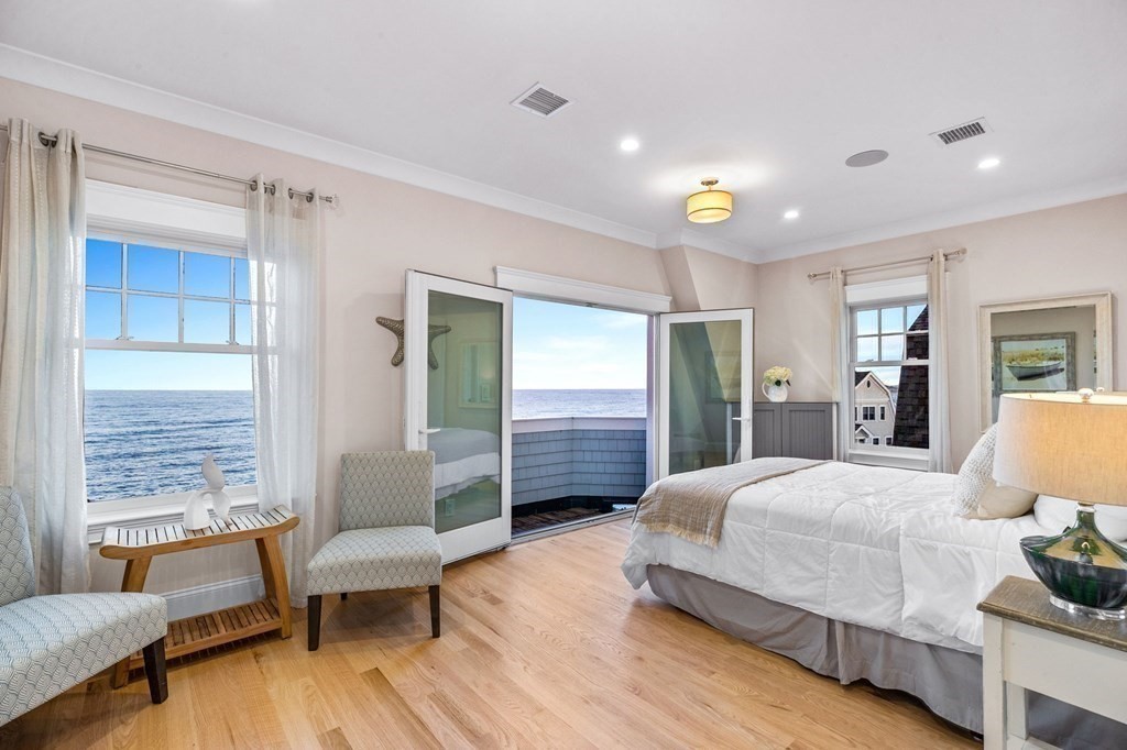 20 Collier Road Scituate, MA 02066 - Photo 18 of 42 a bedroom with a bed and wooden floor