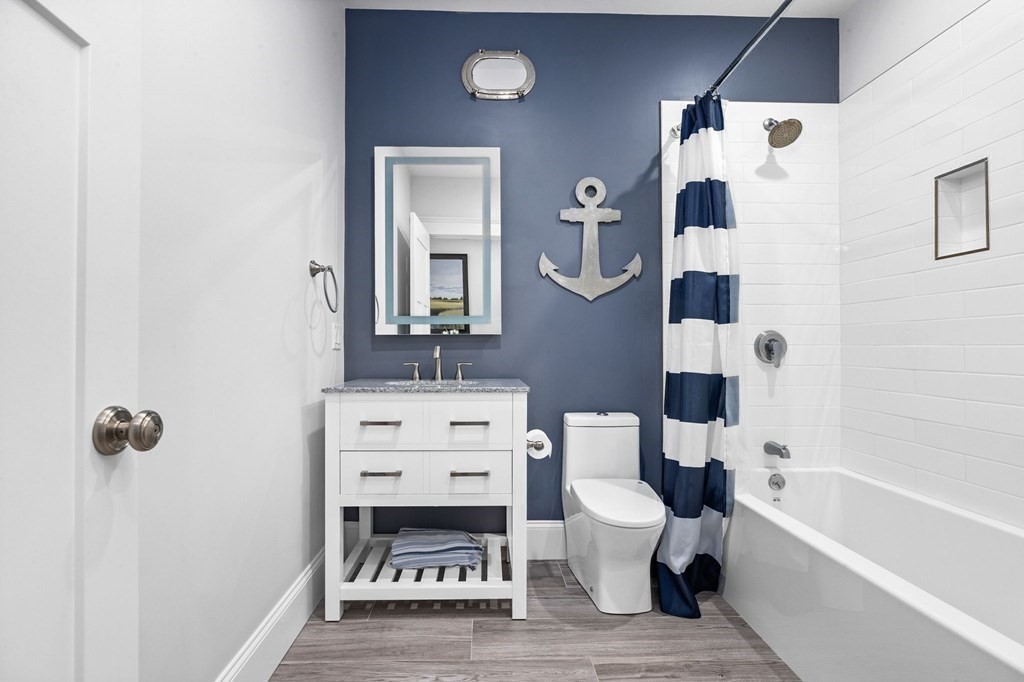 20 Collier Road Scituate, MA 02066 - Photo 24 of 42 a bathroom with a sink toilet and shower