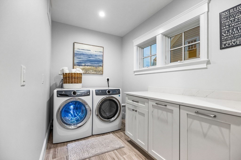 20 Collier Road Scituate, MA 02066 - Photo 28 of 42 a utility room with sink dryer and washer