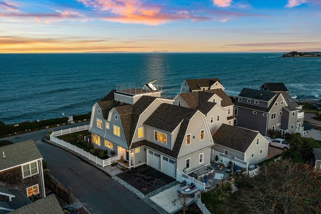 20 Collier Road Scituate, MA 02066 - Photo 38 of 42 a roof deck view with lawn chairs plants and ocean view