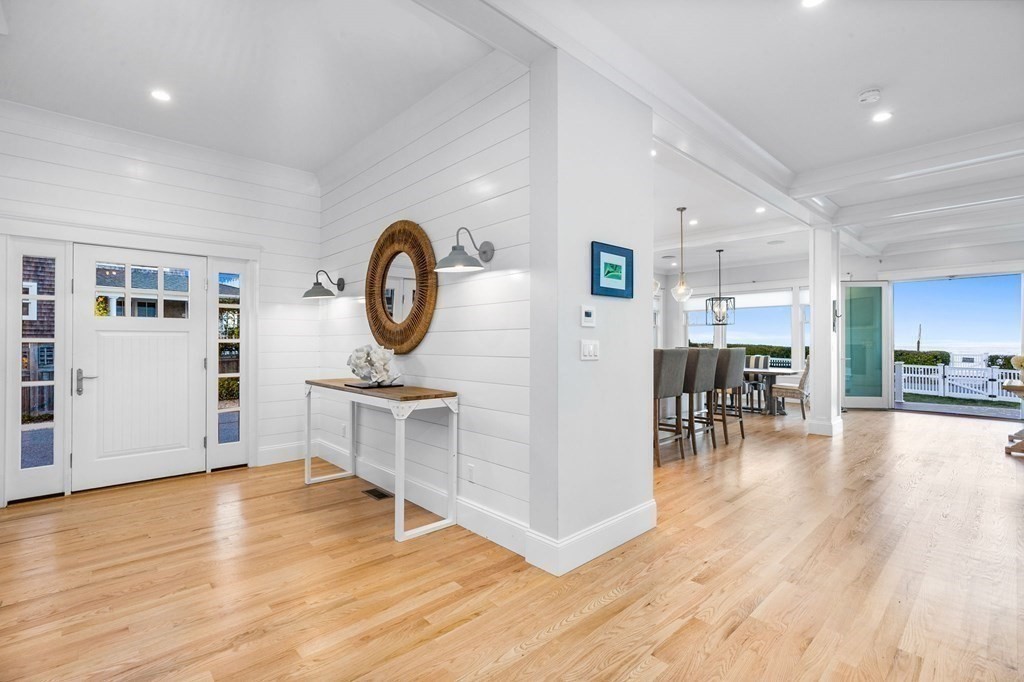 20 Collier Road Scituate, MA 02066 - Photo 7 of 42 a view of a kitchen with dining table and chairs
