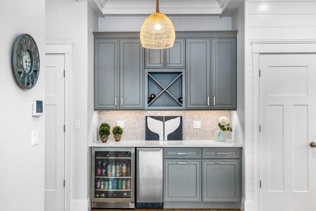 20 Collier Road Scituate, MA 02066 - Photo 8 of 42 a kitchen with a white cabinets and a stove