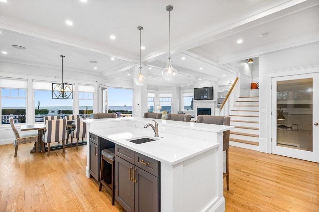 20 Collier Road Scituate, MA 02066 - Photo 9 of 42 a large kitchen with a table and chairs