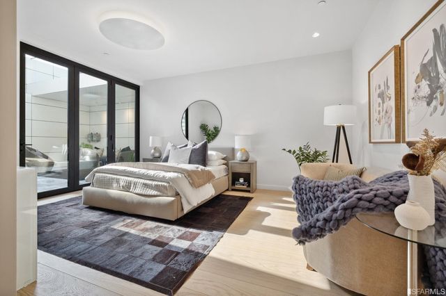 a bathroom with a double vanity sink mirror and double