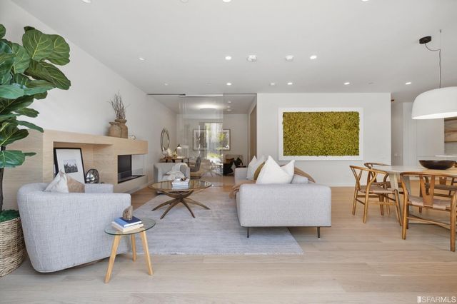 a view of a patio with couches table and chairs