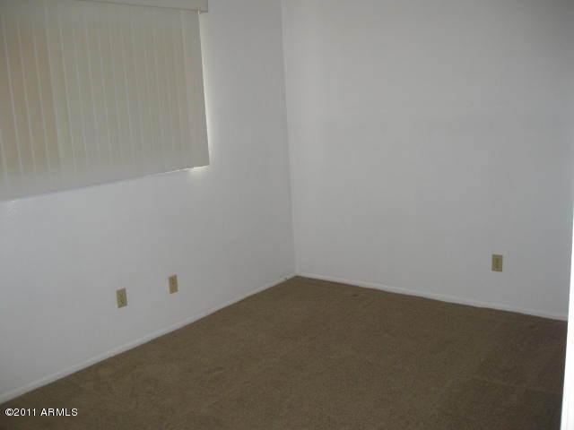 5525 East Thomas Road, Unit 4I Phoenix, AZ 85018 - Photo 12 of 15 Master Bedroom