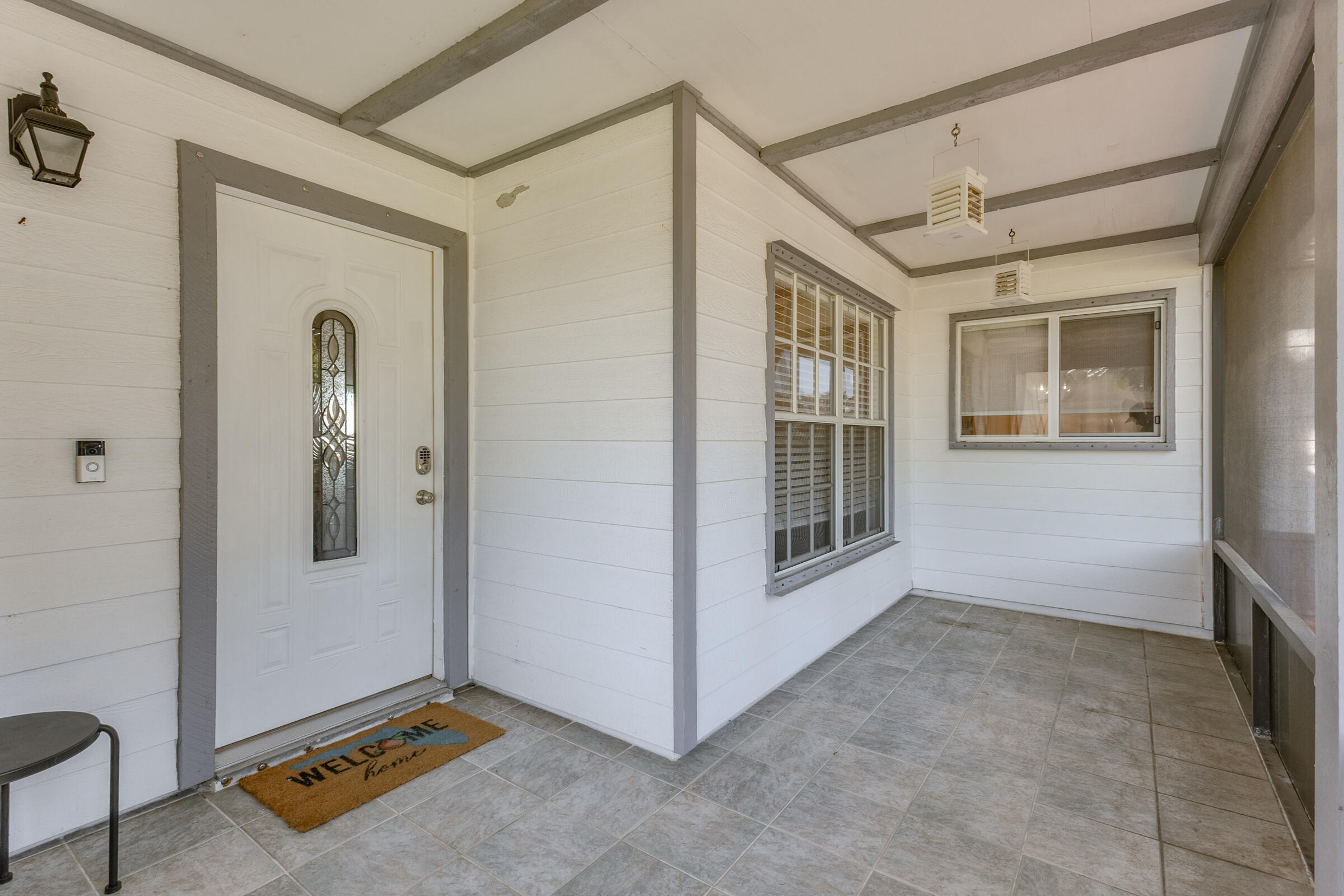 141 Crystal Lake Road Melbourne, FL 32901 - Photo 2 of 44 a view of a hallway with windows