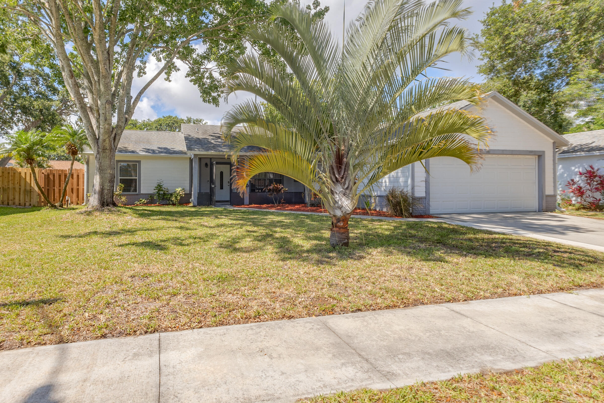 141 Crystal Lake Road Melbourne, FL 32901 - Photo 29 of 44 a view of a house with snow yard