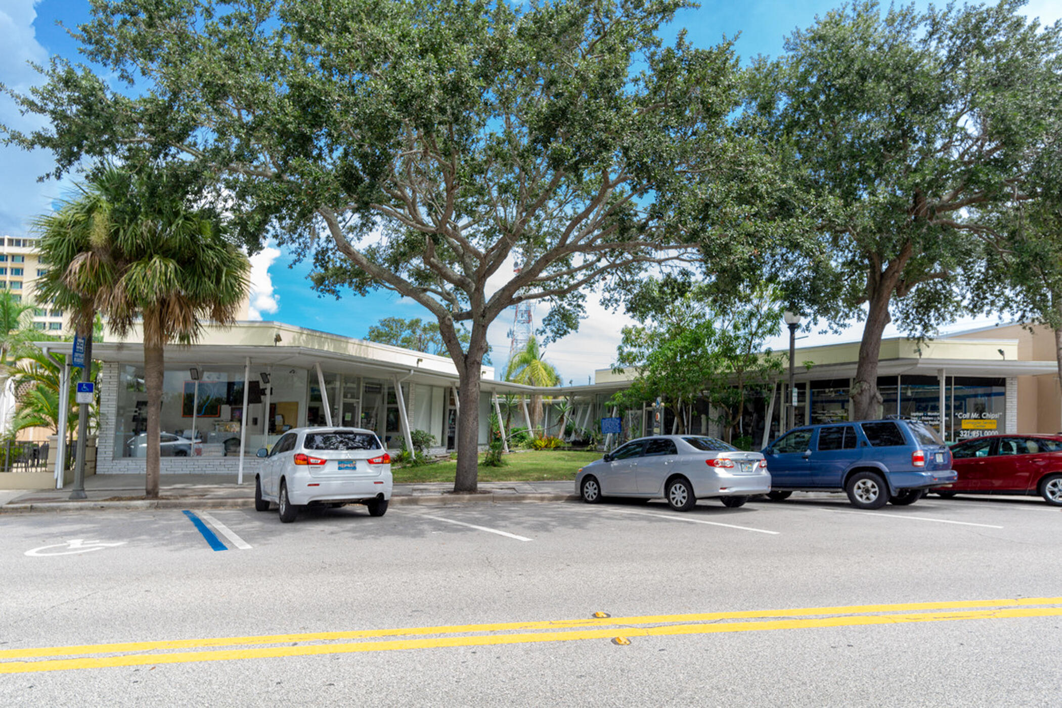 141 Crystal Lake Road Melbourne, FL 32901 - Photo 31 of 44 a car parked on the side of the street