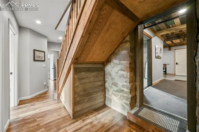 a view of a room with air conditioner duct and materials on floor