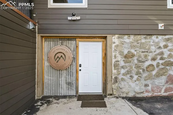 a view of front door with chair