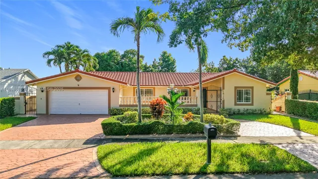 a house view with a garden space