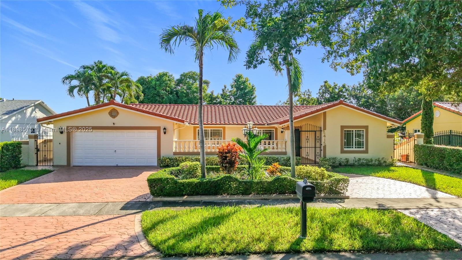 a house view with a garden space