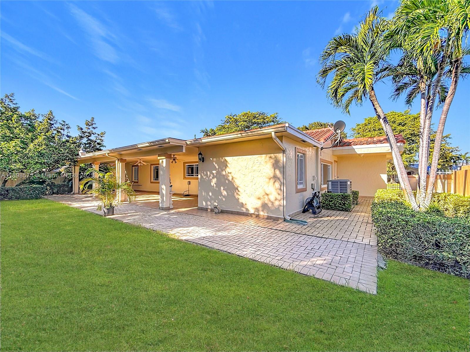 5415 Southwest 135th Court Miami, FL 33175 - Photo 16 of 28 a view of a yard with a house