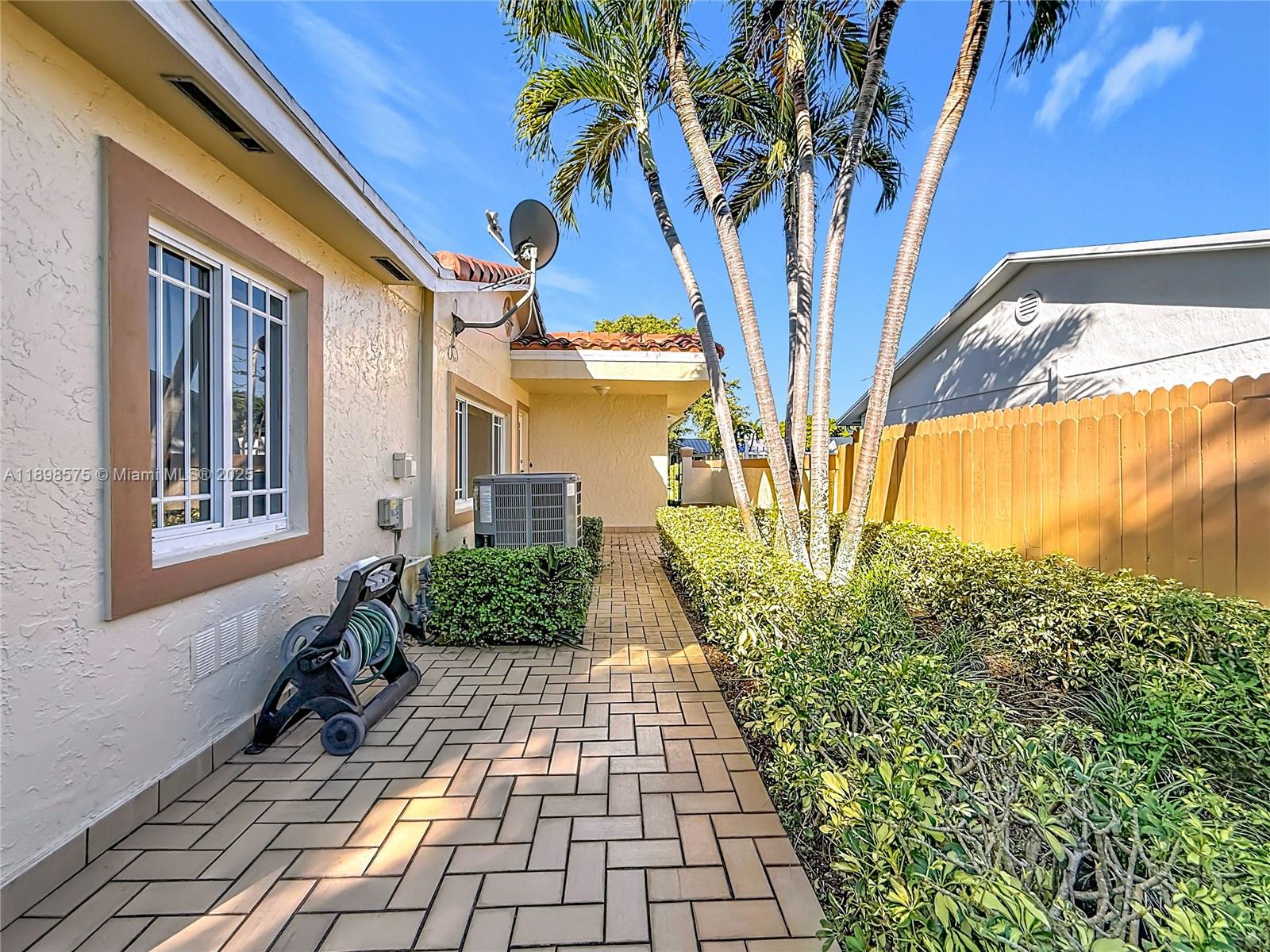 5415 Southwest 135th Court Miami, FL 33175 - Photo 17 of 28 a view of a pathway along with flower pots