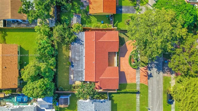 a view of house with outdoor space and sitting area