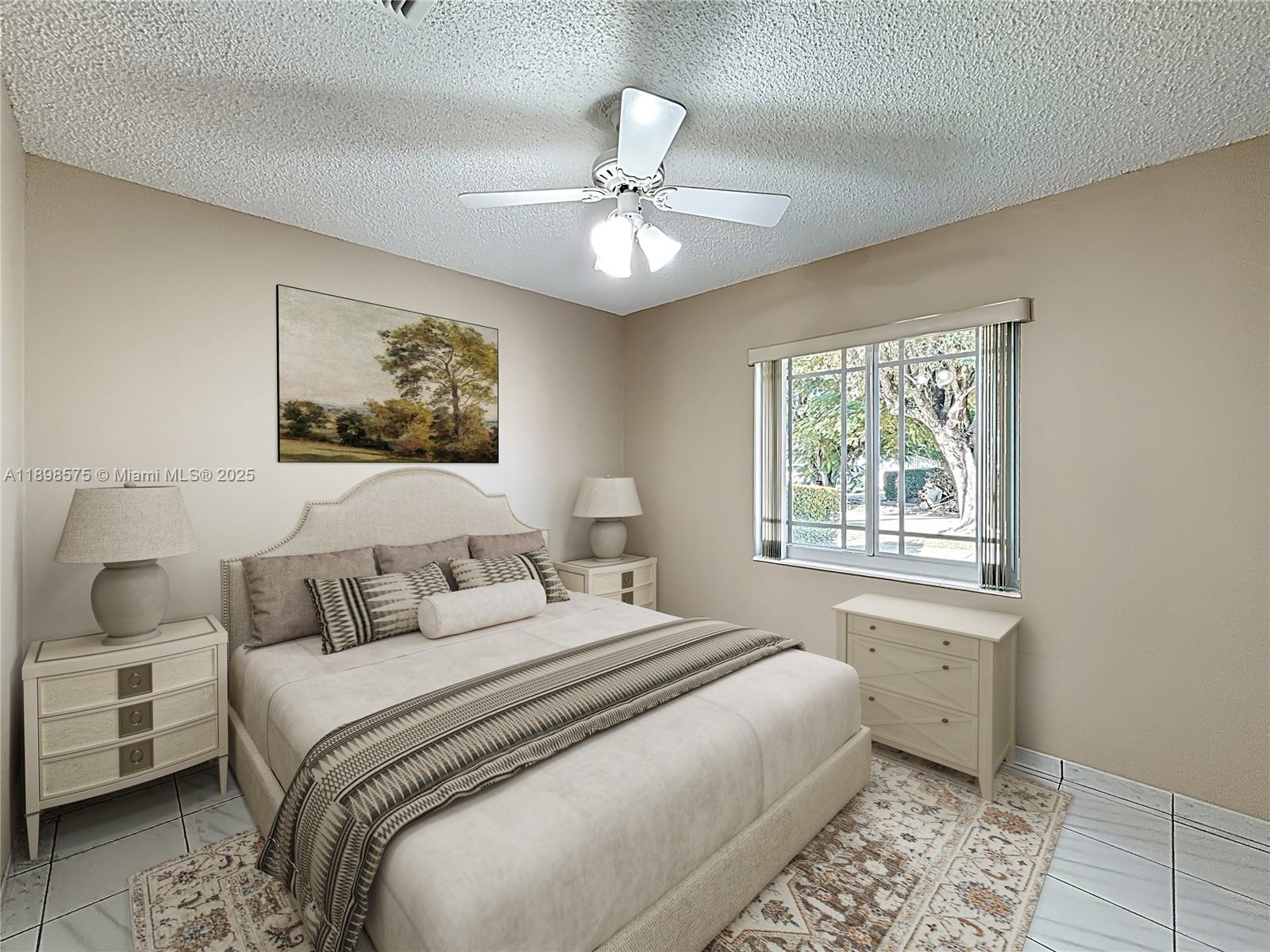 5415 Southwest 135th Court Miami, FL 33175 - Photo 8 of 28 a bedroom with a bed and a window