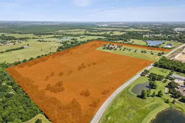 a view of an ocean and city