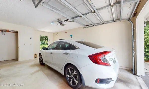 a house with a yard and garage