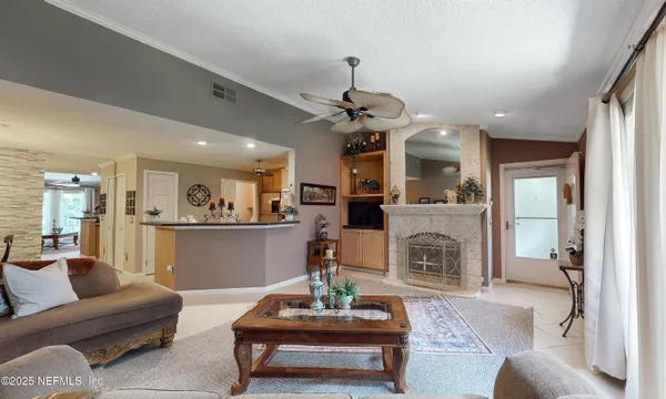 a living room with furniture and a window