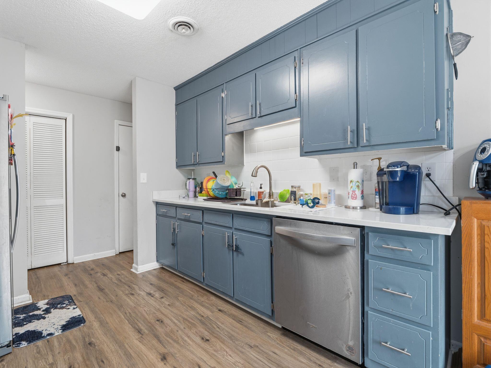90 Fall Drive Collinsville, VA 24078 - Photo 11 of 22 a kitchen with a sink window and cabinets