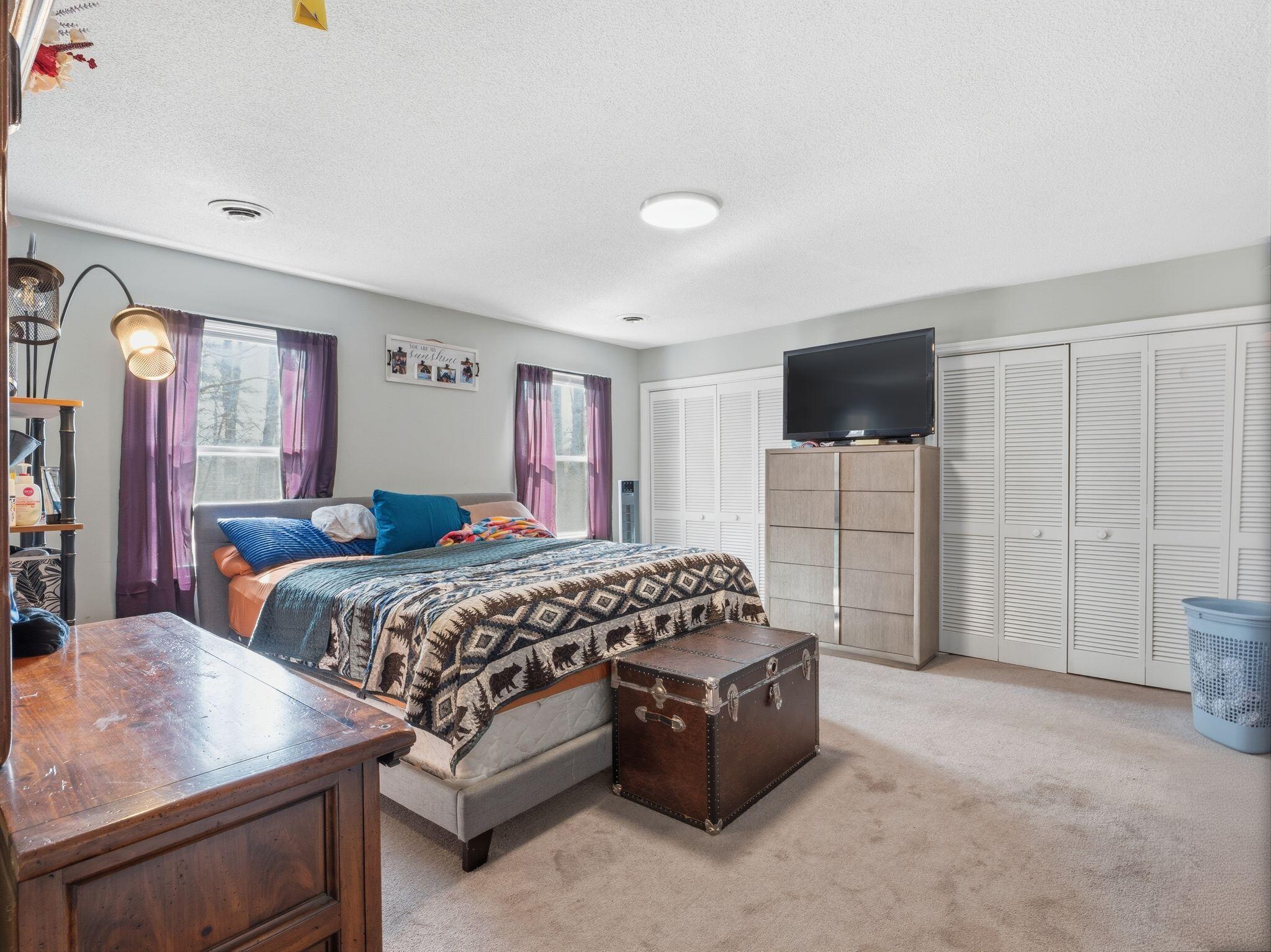 90 Fall Drive Collinsville, VA 24078 - Photo 12 of 22 a bedroom with a bed a couch and dresser