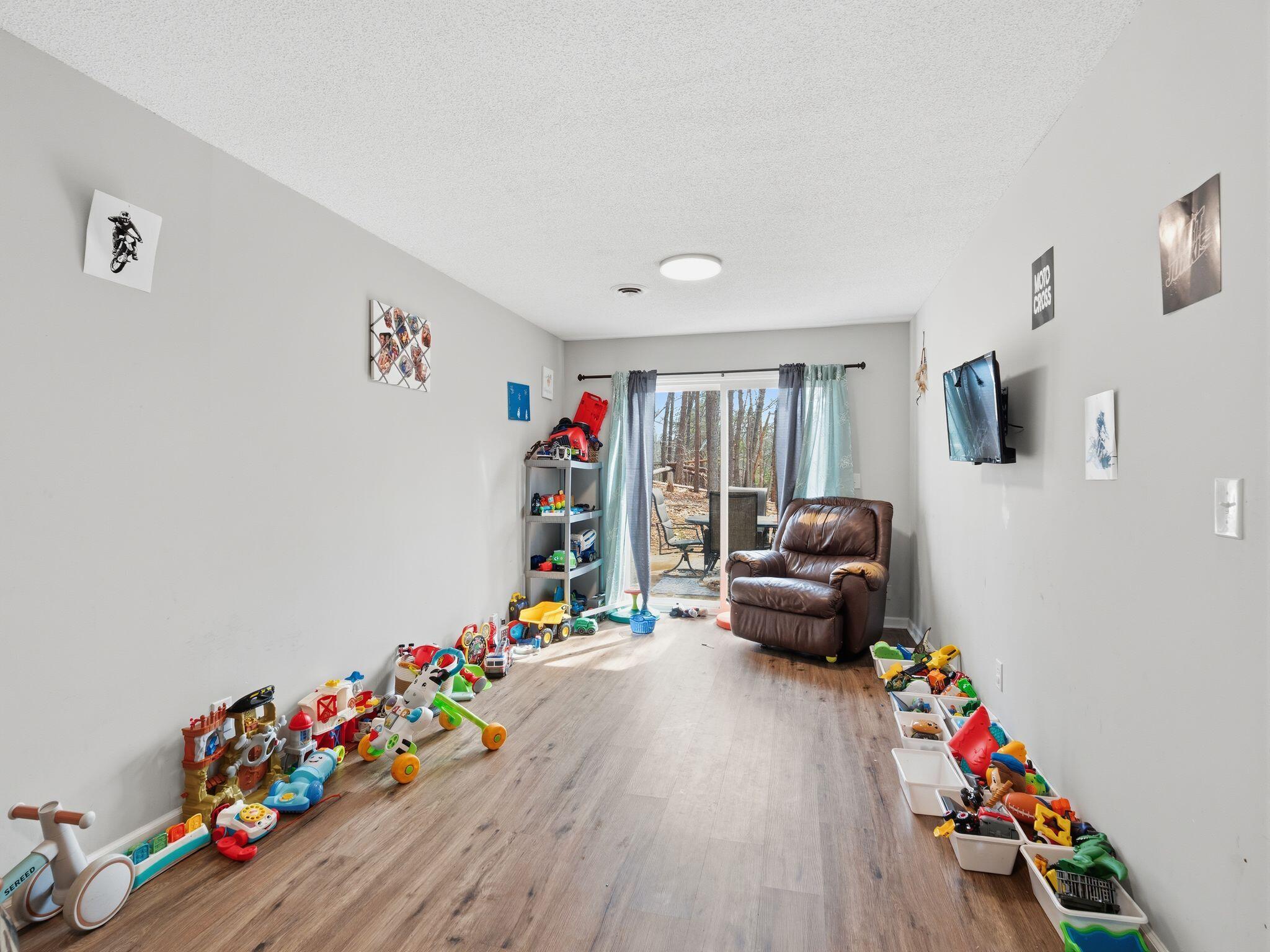 90 Fall Drive Collinsville, VA 24078 - Photo 18 of 22 a living room with furniture and wooden floor