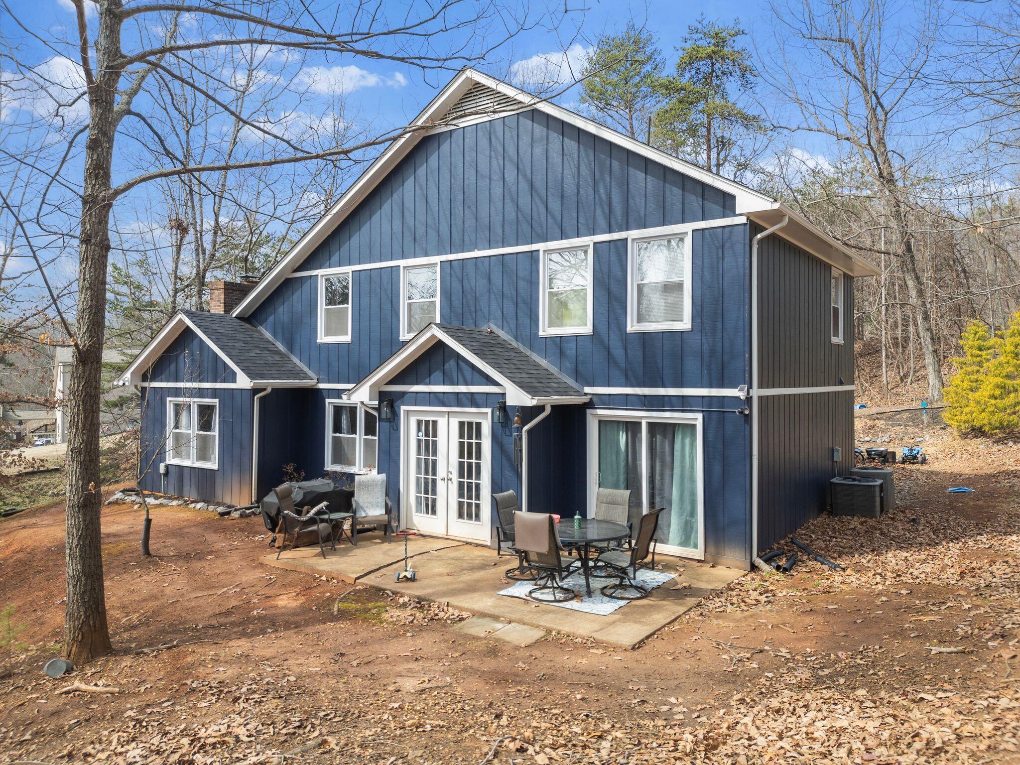 90 Fall Drive Collinsville, VA 24078 - Photo 4 of 22 a front view of a house with a yard outdoor seating and barbeque oven