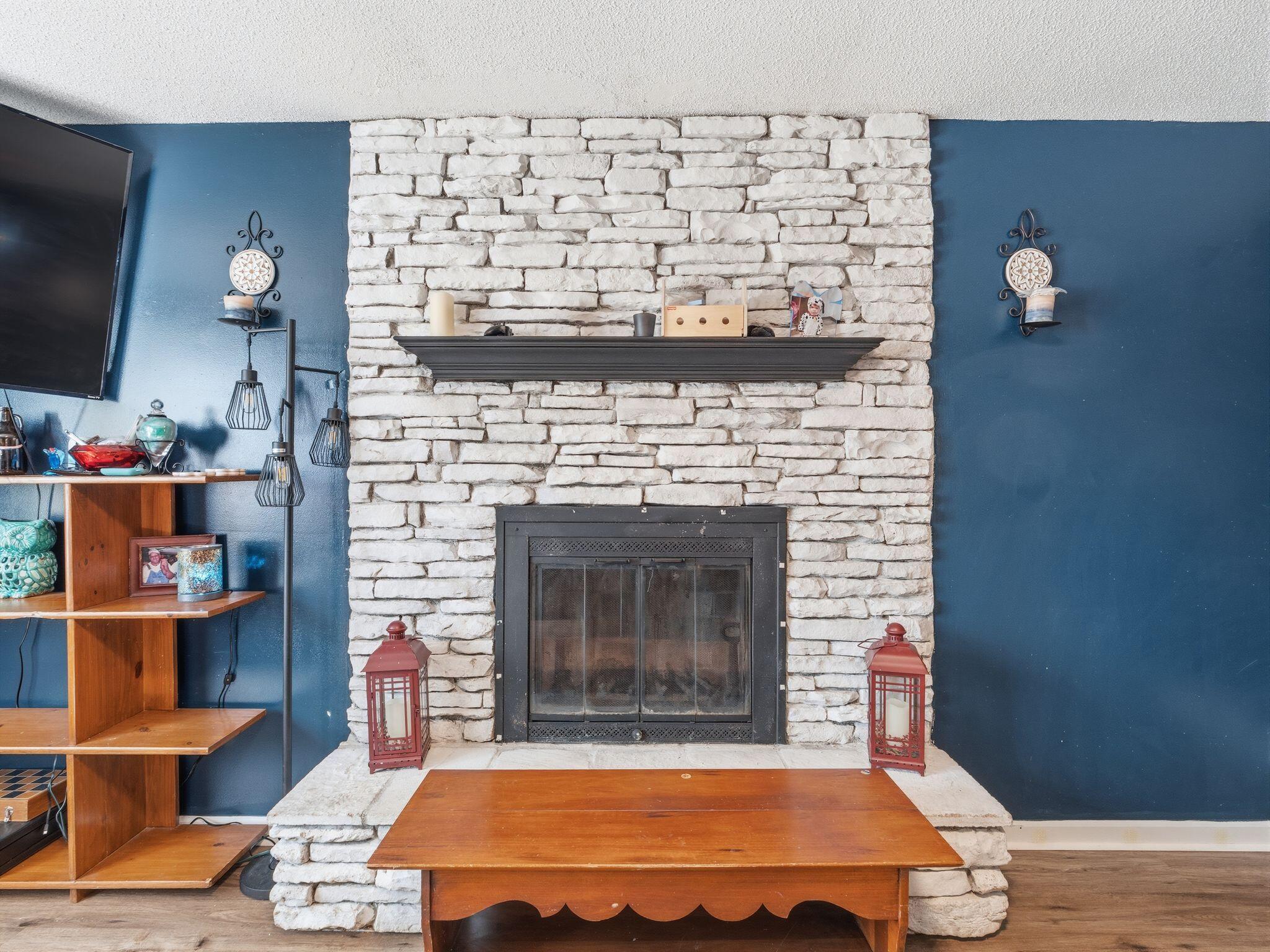 90 Fall Drive Collinsville, VA 24078 - Photo 7 of 22 a room with wooden floor and a fireplace