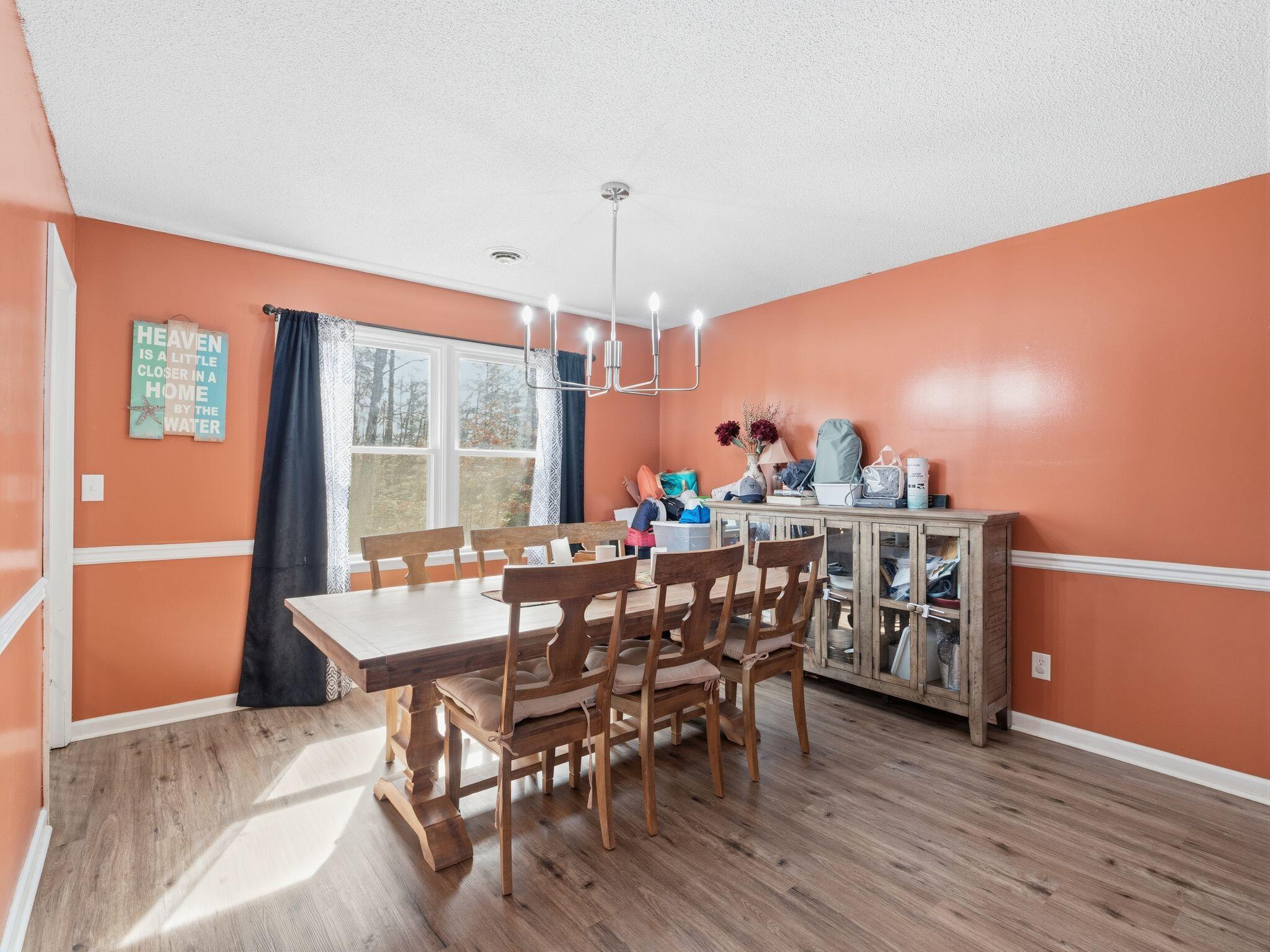 90 Fall Drive Collinsville, VA 24078 - Photo 9 of 22 a view of a dining room with furniture window and outside view