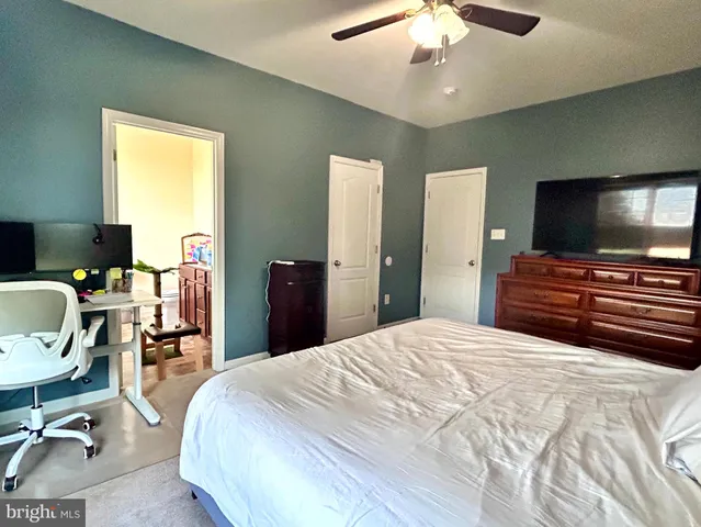 a bath tub sitting next to a window