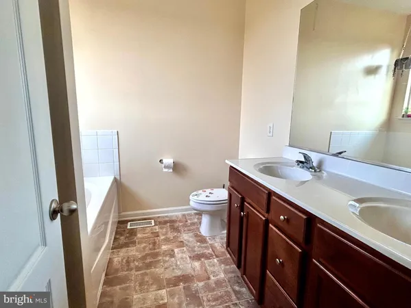 a bathroom with a bathtub